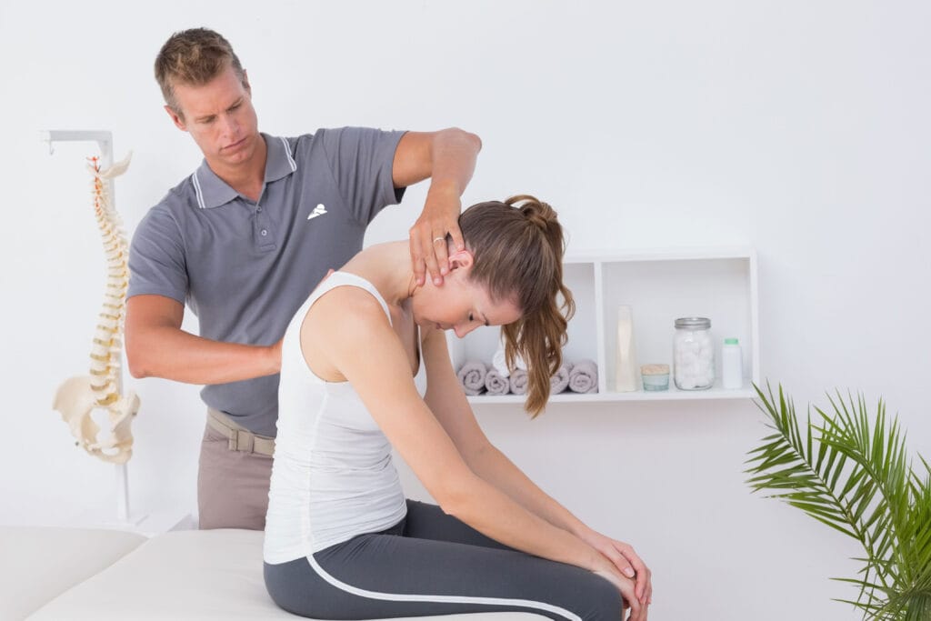Physical Therapist Treating Whiplash