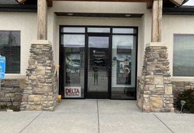 Outside view of front doors to mountain land physical therapy delta clinic